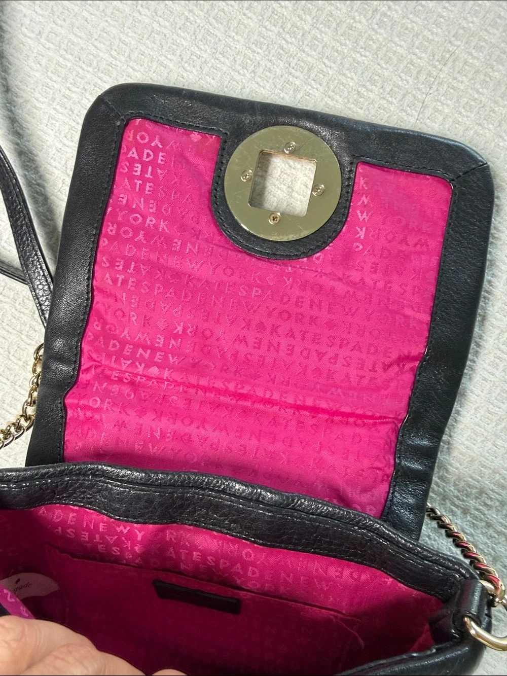 Kate Spade black quilted leather crossbody bag with gold chain and hardware